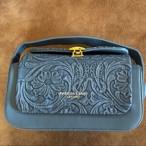 Embossed Floral Blue Handbag with Gold Accent Leather Clutch or Crossbody